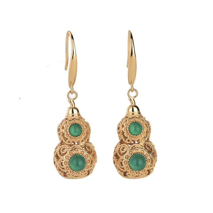 dangling gold earrings
